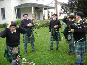 The Lucknow Fair Parade, September 21st, 2013. Rain threatened, but did not materialize, and Joy Rutherford made the call: 'no capes!'. The parade route, as always, was downhill and short. Above, left to right: Marg Hancock, Alan Grant, Jerry Mowbray, Lisa Jamieson, Dave Pritchard. (Photos by Gord Ripley)